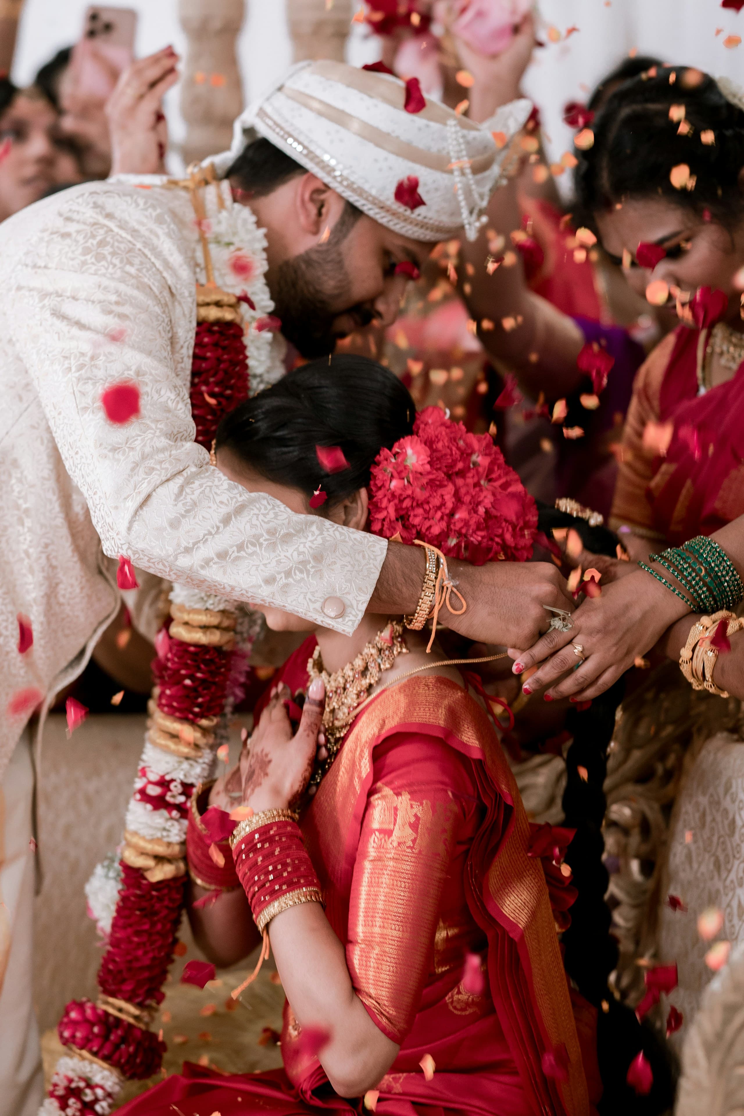 Indian wedding celebration with flower petals